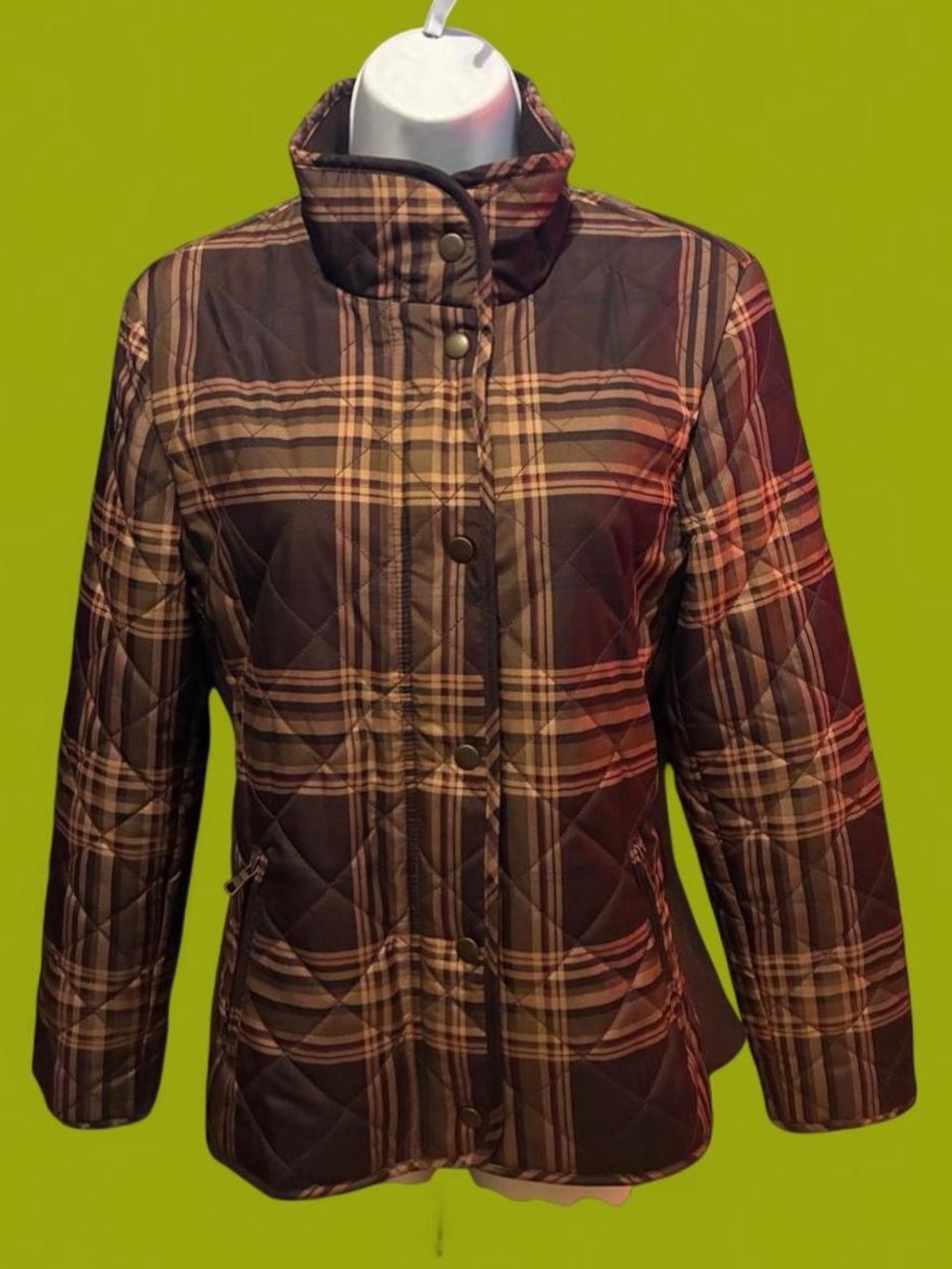 Quilted brown and tan plaid snap-front jacket.